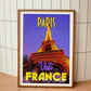 Wood-framed vintage travel poster print featuring the renowned Eiffel Tower in Paris, symbolizing the allure and charm of emerging travel destinations worldwide.