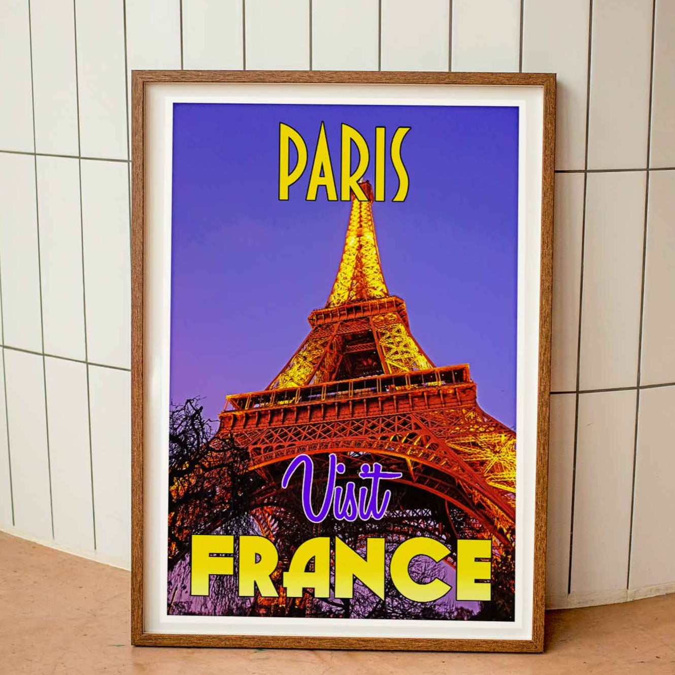 Wood-framed vintage travel poster print featuring the renowned Eiffel Tower in Paris, symbolizing the allure and charm of emerging travel destinations worldwide.