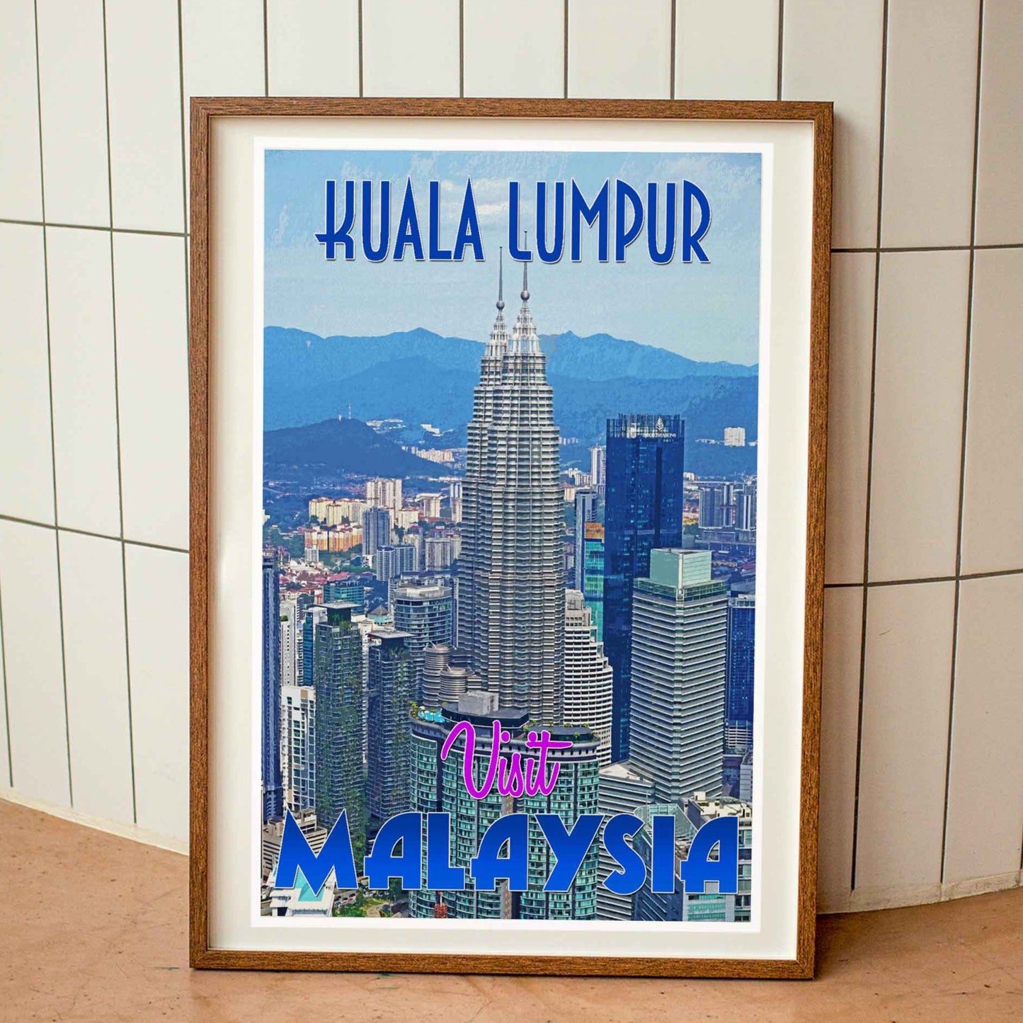 Wood-framed vintage travel poster print featuring the striking skyline of Kuala Lumpur, Malaysia, highlighting the allure and dynamism of emerging travel destinations worldwide.