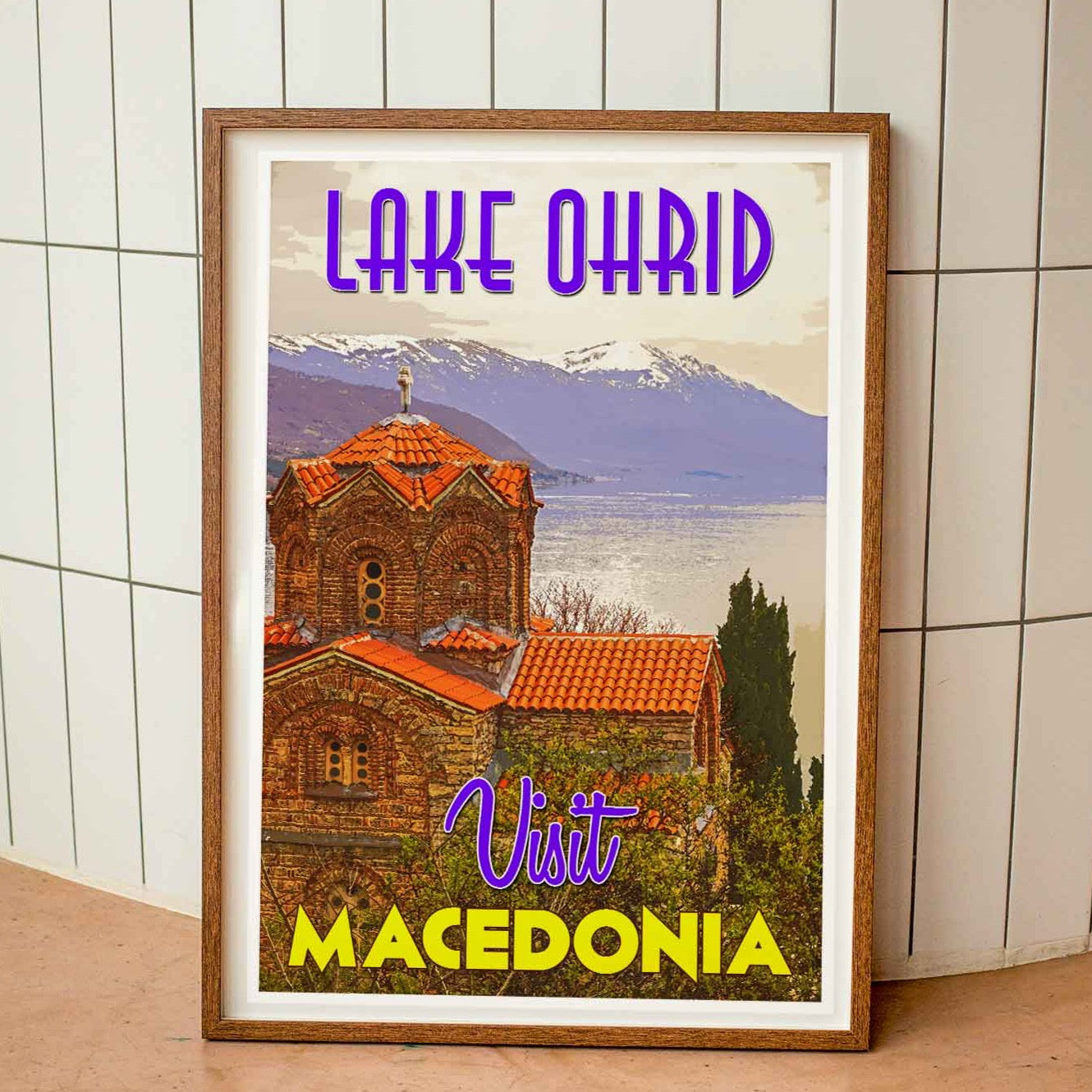 Wood-framed vintage travel poster print featuring the tranquil Lake Ohrid in Macedonia, capturing the beauty of emerging travel destinations in the world