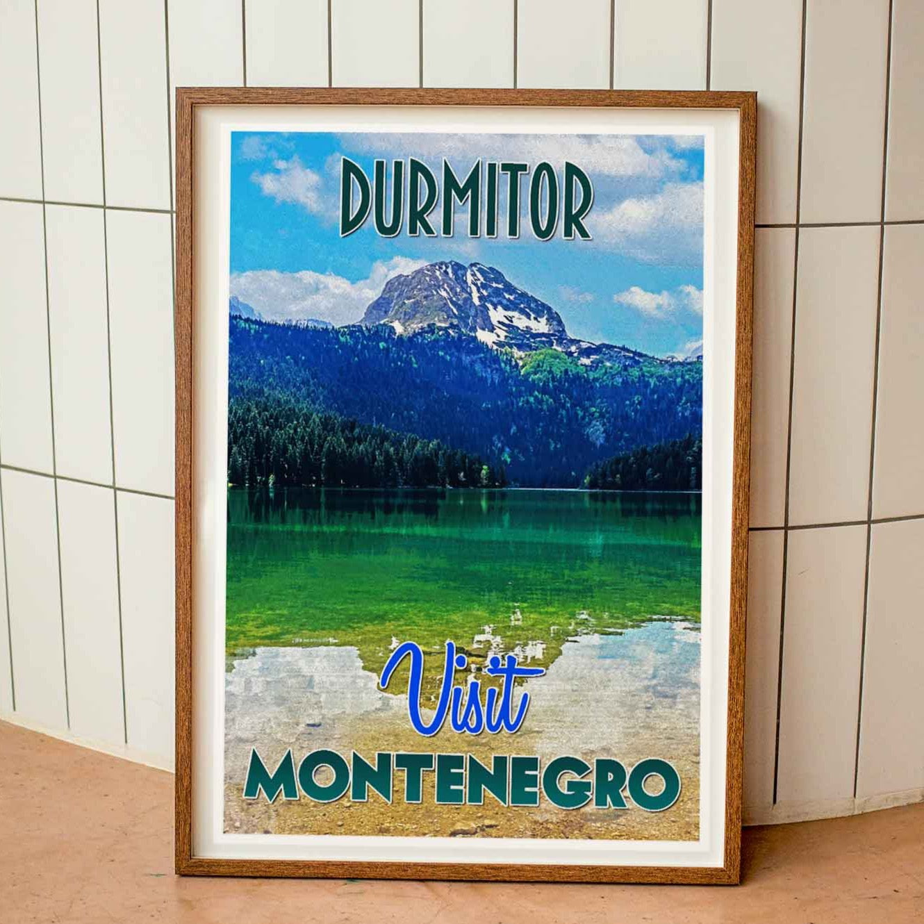 Wood-framed vintage travel poster print featuring the stunning landscapes of Durmitor in Montenegro, a testament to the allure of emerging travel destinations in the world