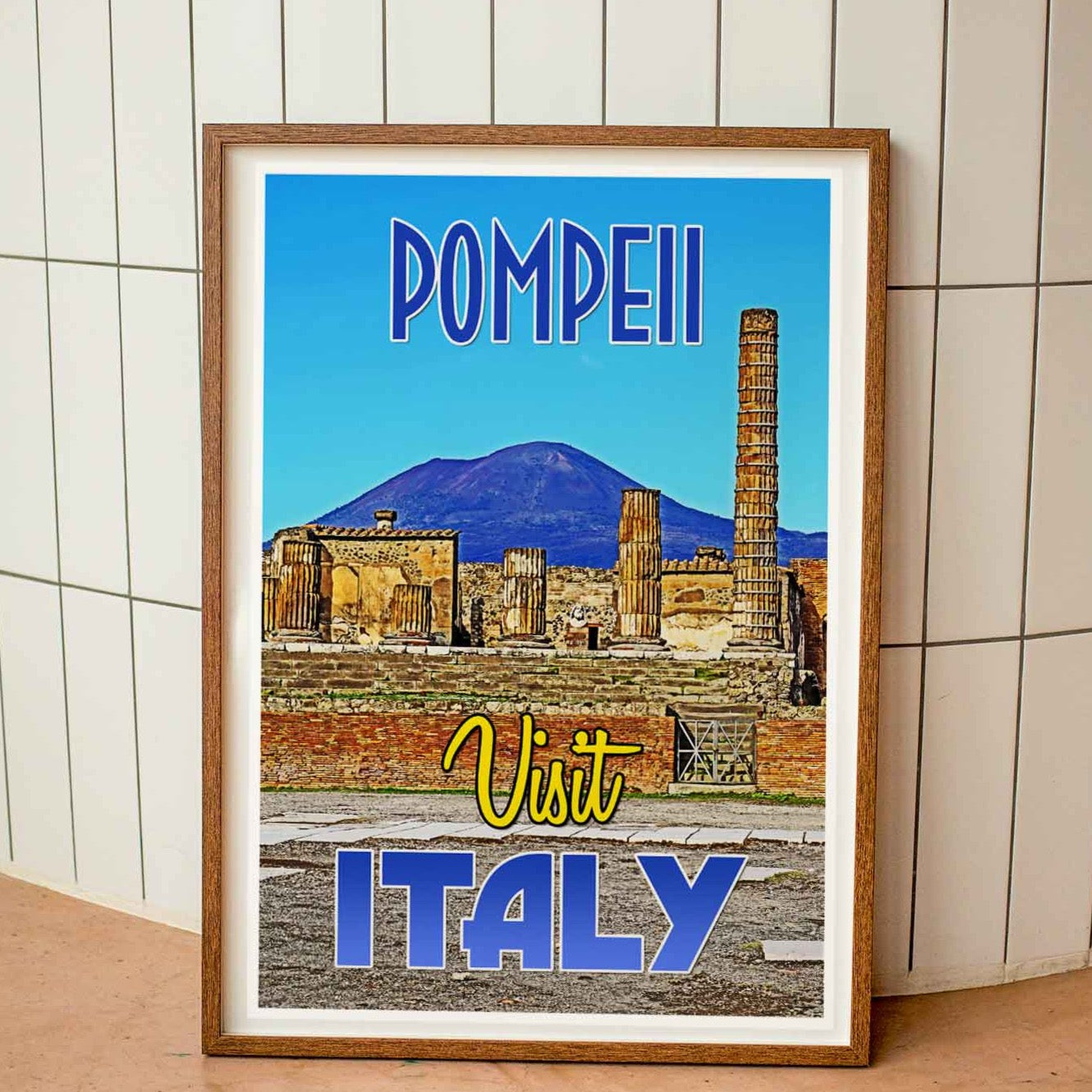 Wood-framed vintage travel poster print featuring the ancient ruins of Pompeii in Italy, embodying the adventure and appeal of emerging travel destinations worldwide